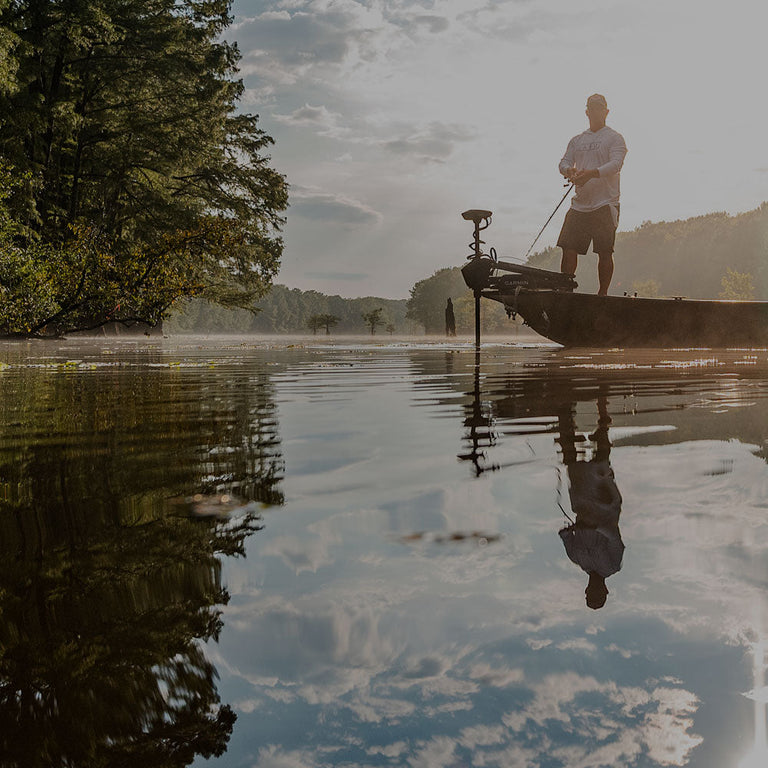 Bobby Lane fishing on a boat